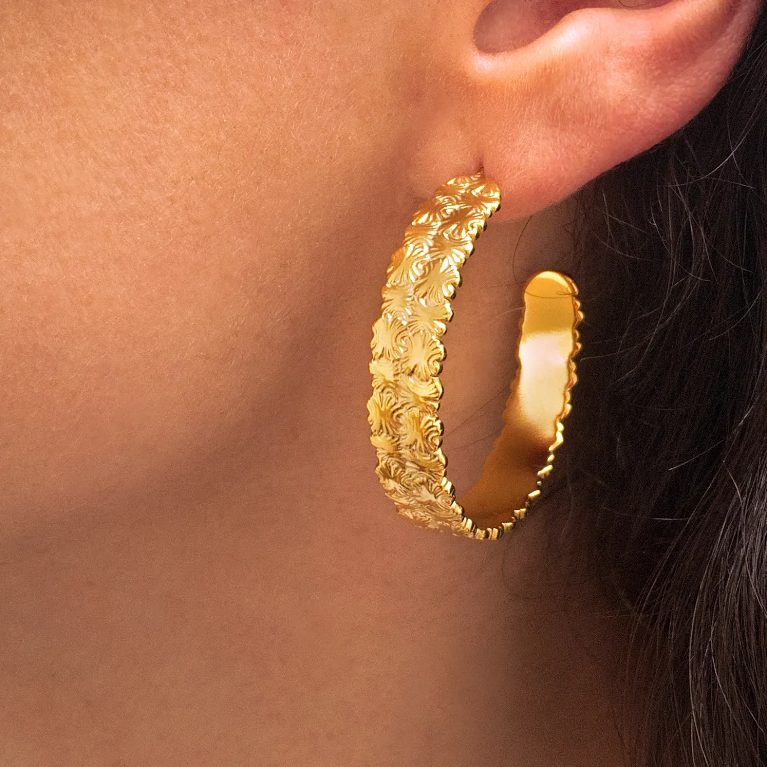 Boucle d'oreille éclat d'or